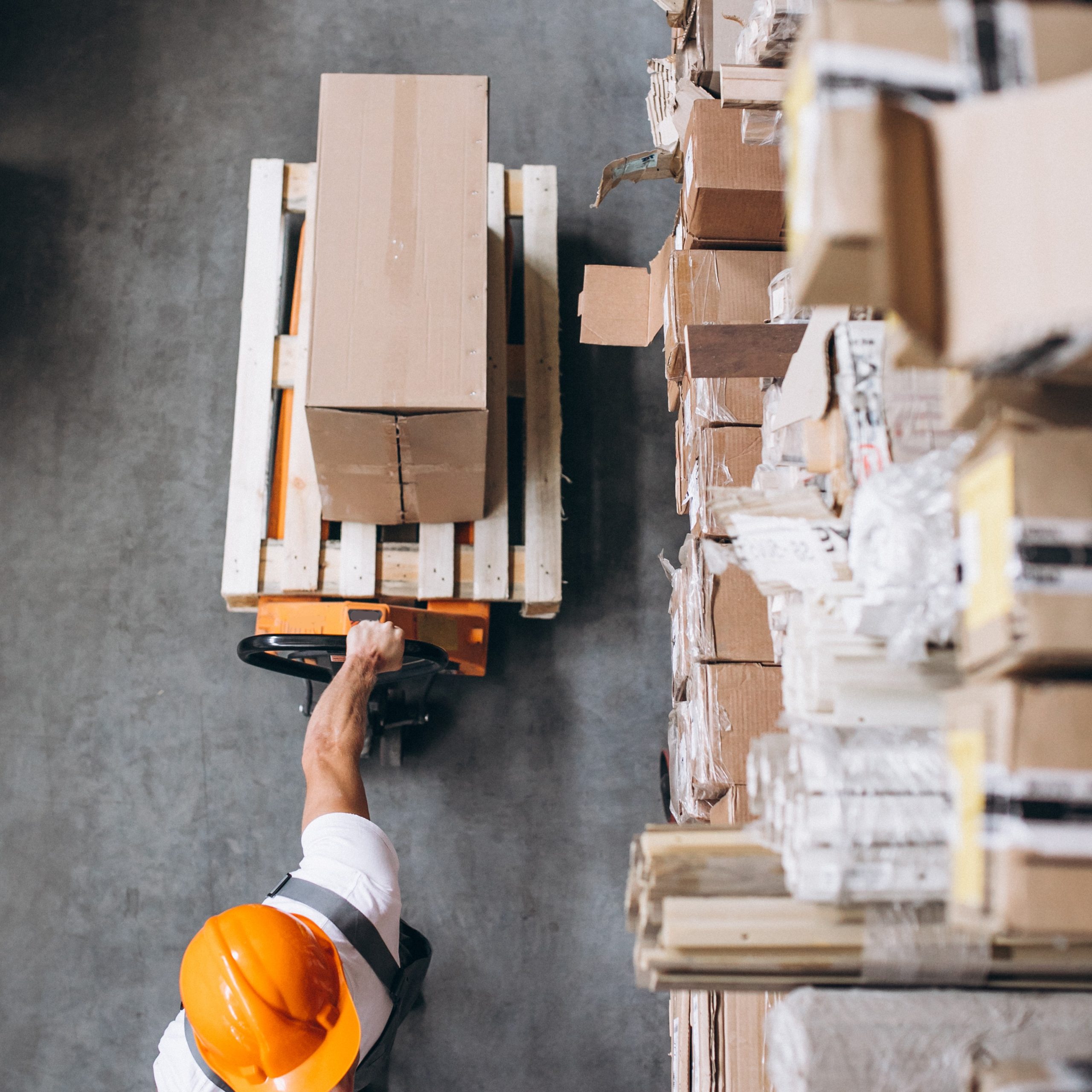 Young man working warehouse with boxes 1 1 square